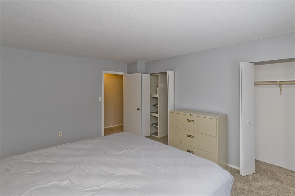 169 Nassau Drive, Unit 169 Springfield, MA 01129 - Photo 22 of 31 a view of a room with closet area