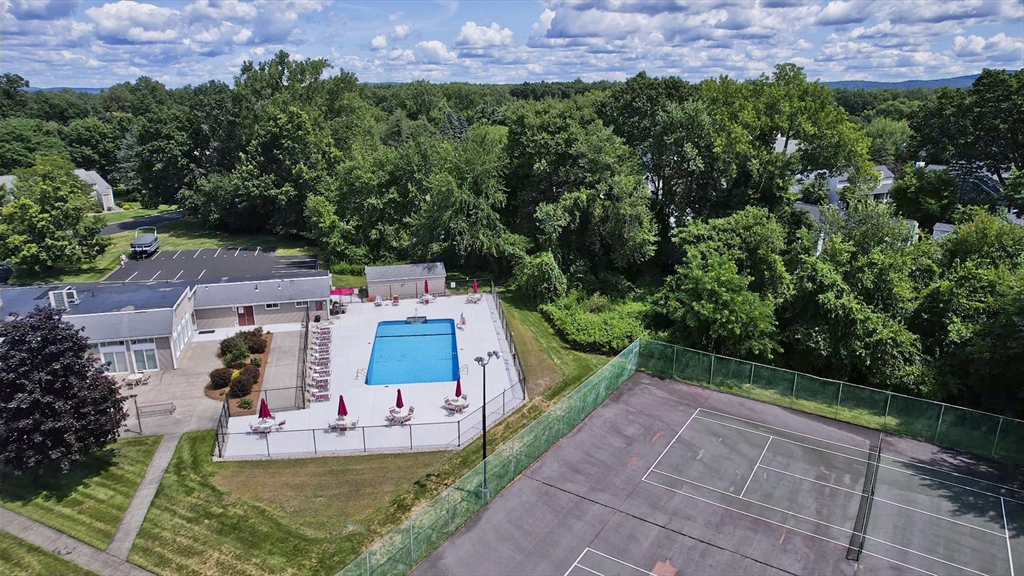 169 Nassau Drive, Unit 169 Springfield, MA 01129 - Photo 29 of 31 an aerial view of a house with outdoor space swimming pool and mountains