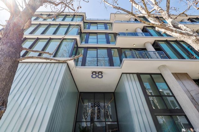 a view of a room with entryway and furniture