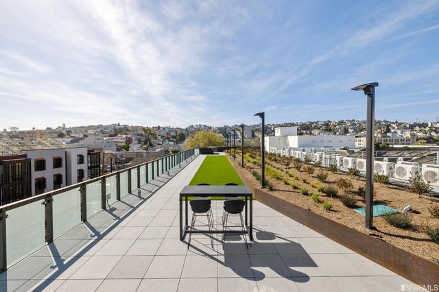 a view of a terrace with chairs
