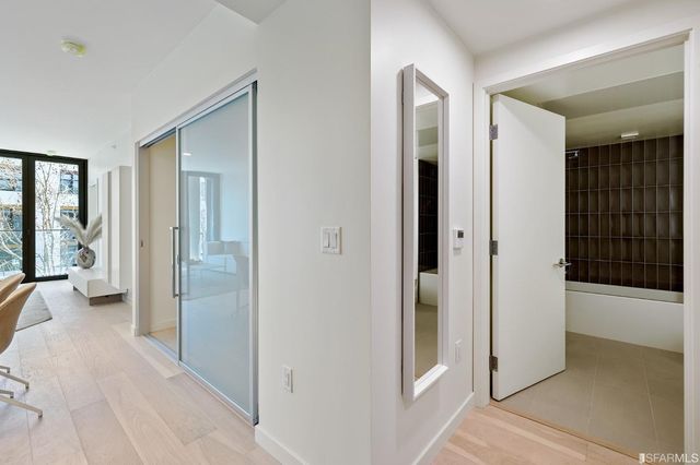 a kitchen with a stove a sink and cabinets