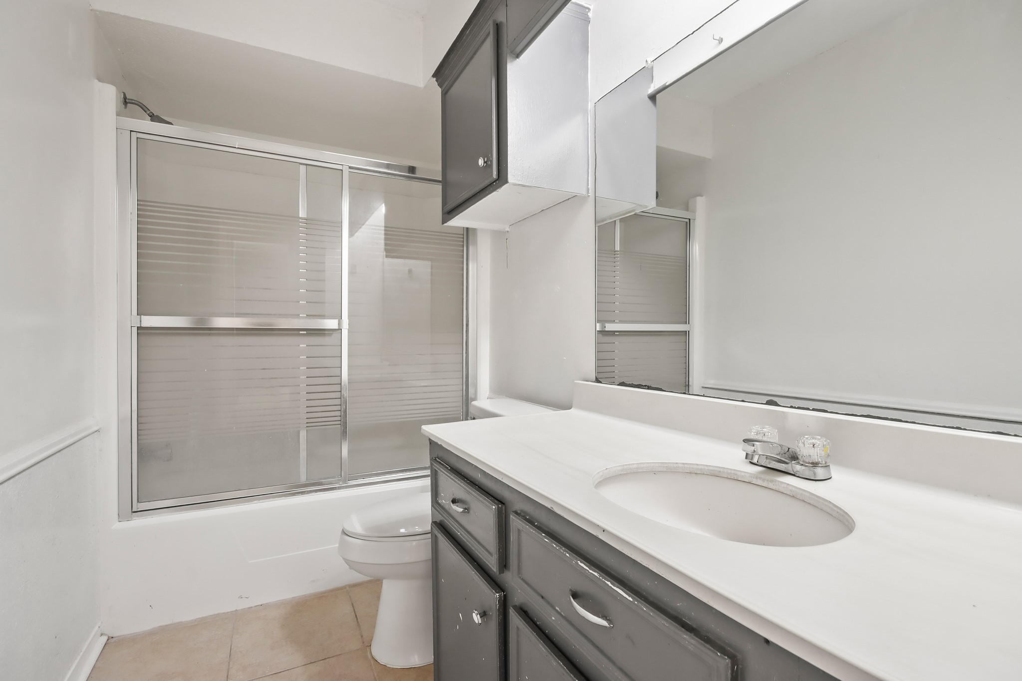 6919 River Mill Drive Spring, TX 77379 - Photo 18 of 26 Secondary Bath offers tub/shower combo and large vanity