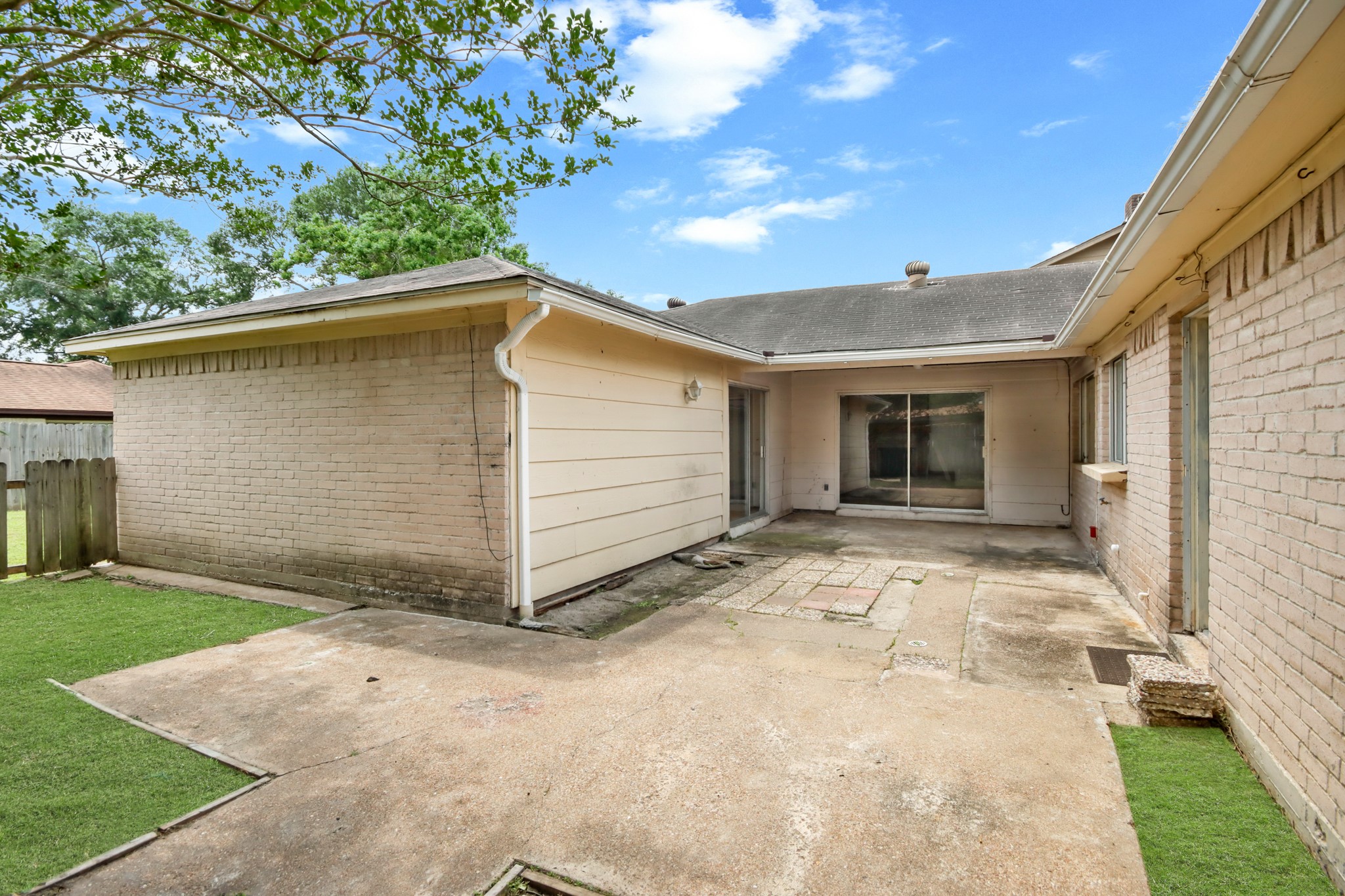 6919 River Mill Drive Spring, TX 77379 - Photo 23 of 26 Courtyard area creates a unique indoor-outdoor entertaining space with tons of potential.
