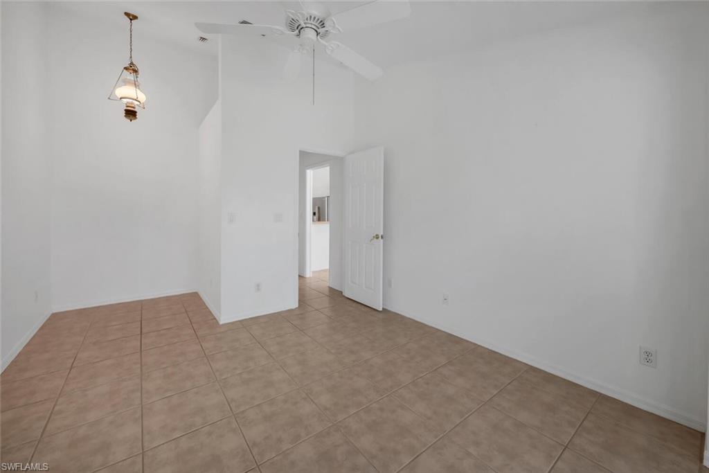 1946 Timberline Drive Naples, FL 34109 - Photo 15 of 19 a view of an empty room