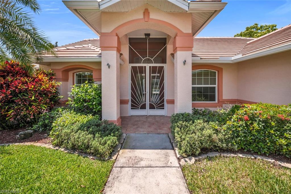 1946 Timberline Drive Naples, FL 34109 - Photo 3 of 19 front view of a house