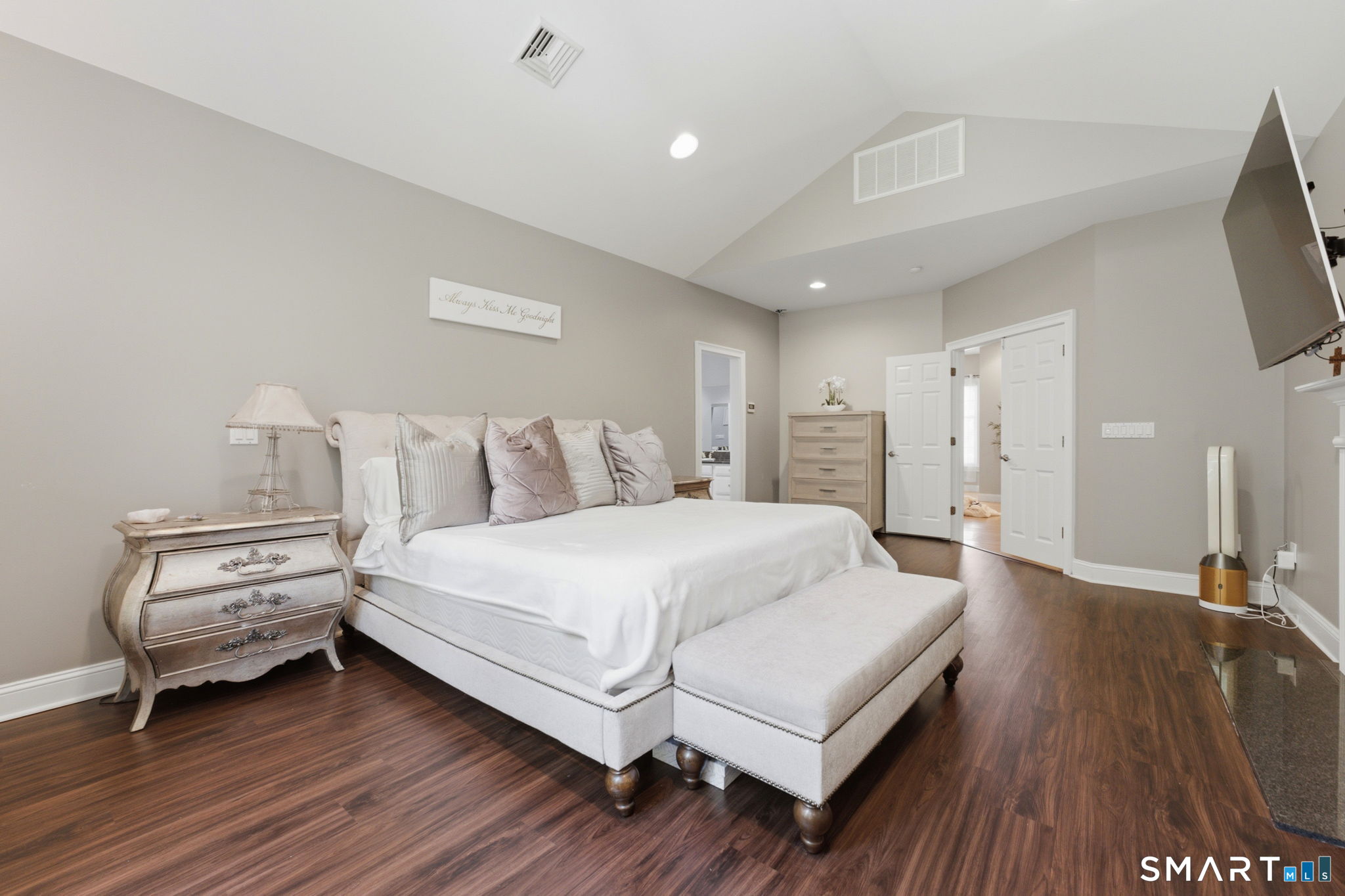 52 Country Club Road Bolton, CT 06043 - Photo 22 of 36 a spacious bedroom with a bed and a flat screen tv