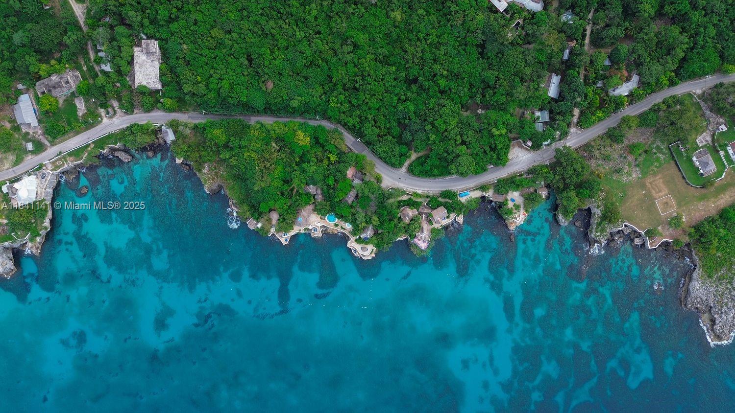 144 One Love Drive undefined, - 00000 - Photo 2 of 34 a view of a yard with a tree