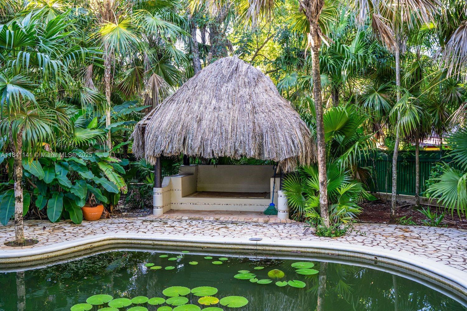 144 One Love Drive undefined, - 00000 - Photo 9 of 34 a garden view with a seating space