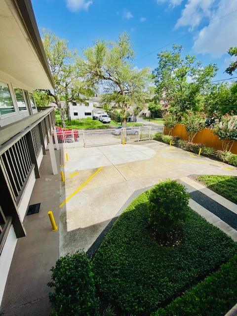 4701 Bell Street, Unit 10 Houston, TX 77023 - Photo 16 of 19 a view of a swimming pool with an outdoor seating and a lots of plants