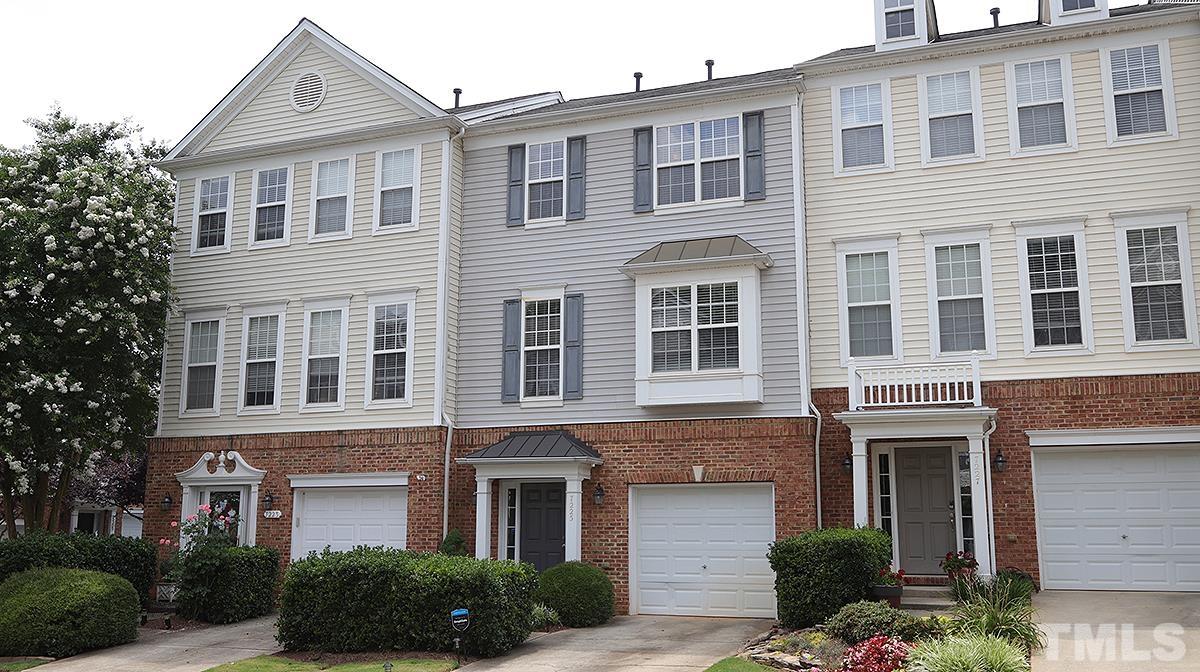 7225 Galon Glen Road Raleigh, NC 27613 - Photo 1 of 20 a front view of a house with plants and windows