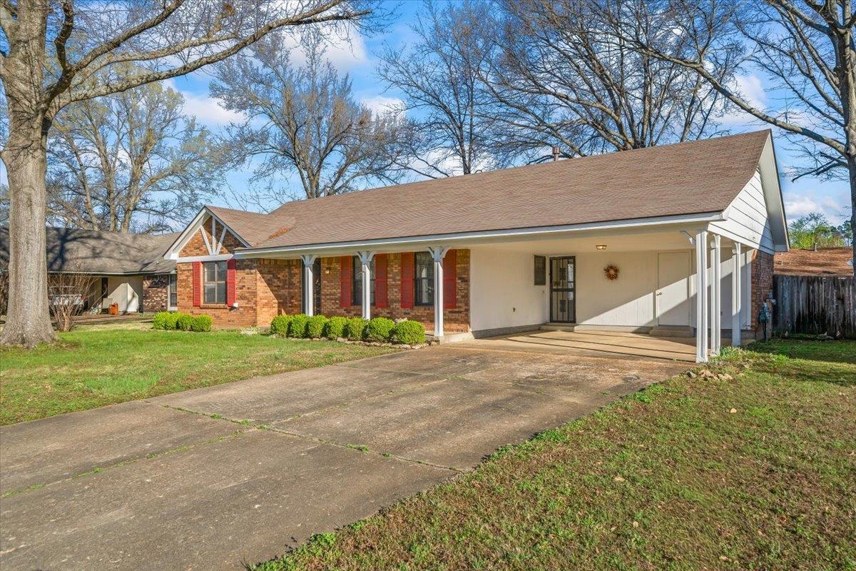 6824 Dawnhill Road Bartlett, TN 38135 - Photo 19 of 31 a view of a house with a yard and large tree