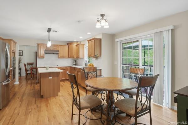29 Hickory Hill Road Newburgh, NY 12550 - Photo 22 of 47 a view of a dining room with furniture window and wooden floor