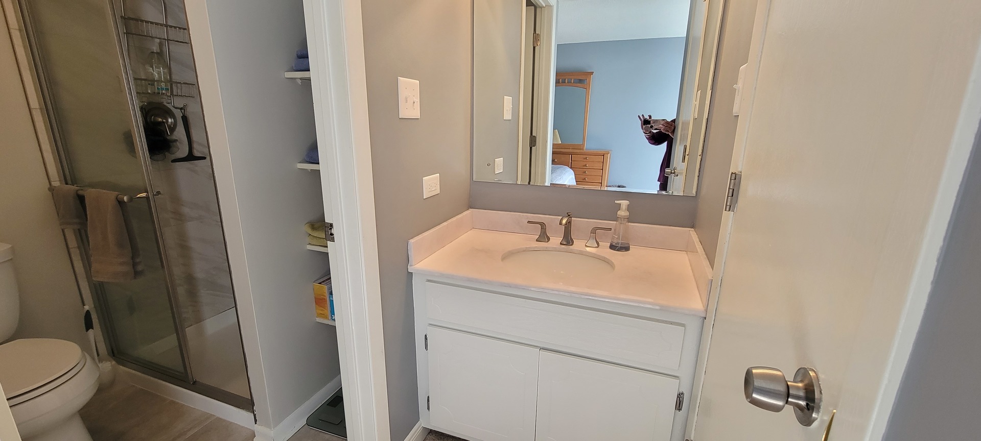 525 Cumnor Road, Unit 302 Westmont, IL 60559 - Photo 6 of 12 a bathroom with a sink toilet and shower