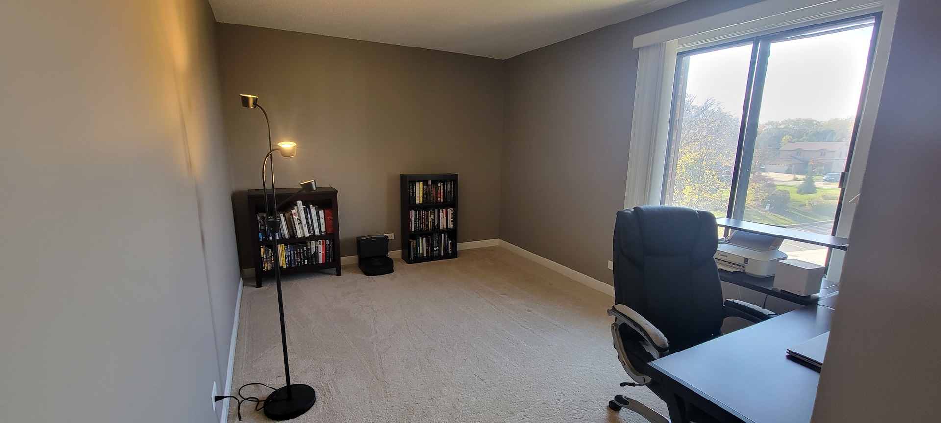 525 Cumnor Road, Unit 302 Westmont, IL 60559 - Photo 8 of 12 a view of a workspace with furniture and a window