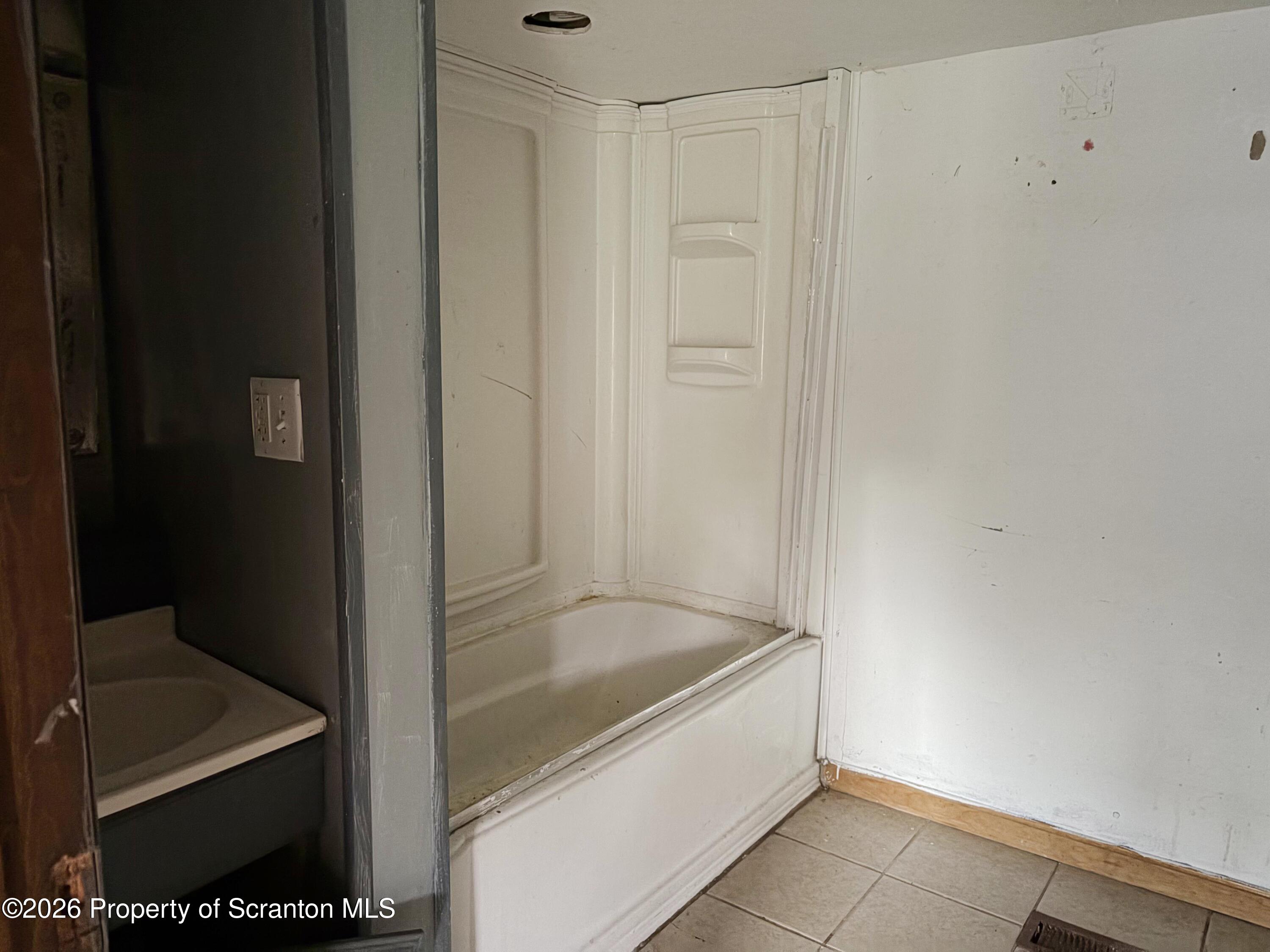 2466 State Rte 4002 Mehoopany, PA 18629 - Photo 5 of 11 a bathroom with a bathtub