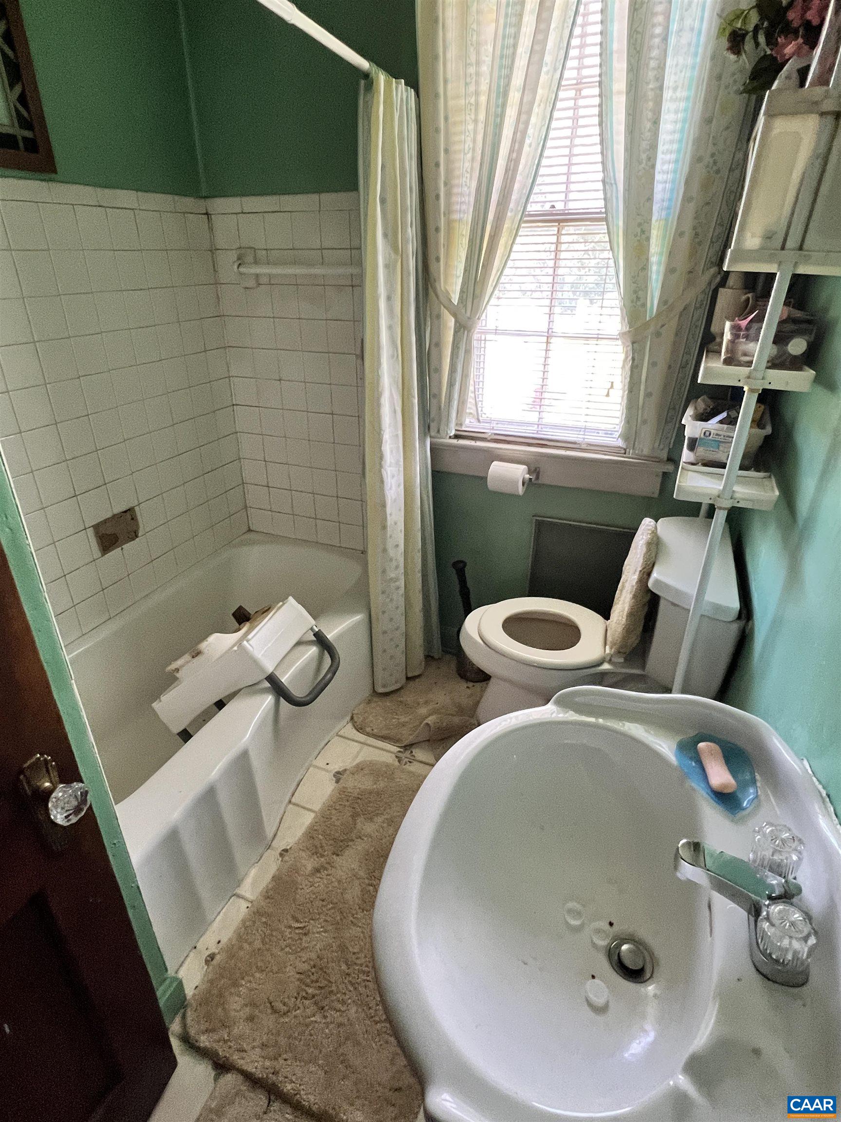 2857 Cedar Lane Road Kents Store, VA 23084 - Photo 36 of 36 a bathroom with a sink and mirror