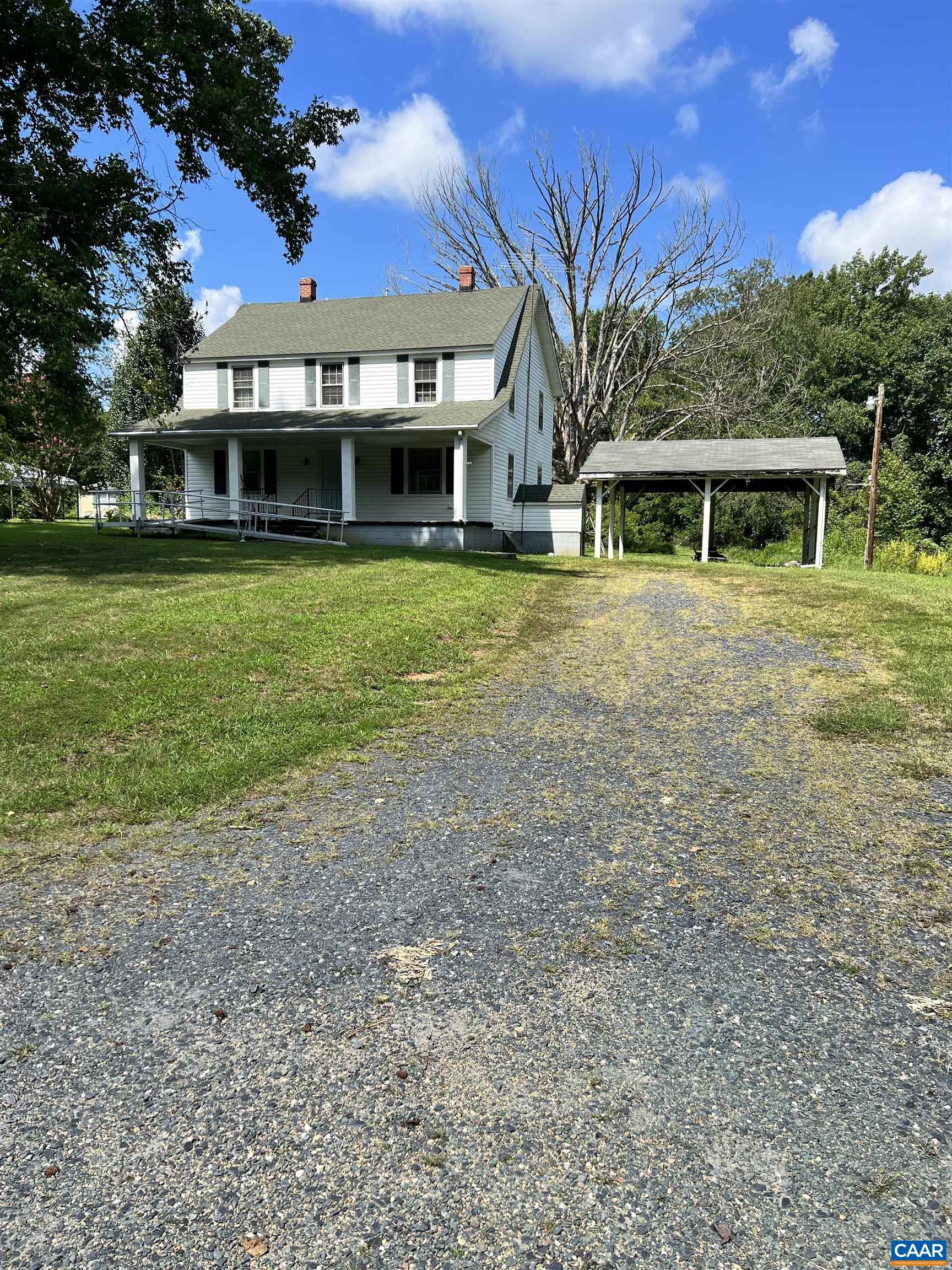 2857 Cedar Lane Road Kents Store, VA 23084 - Photo 7 of 36 a front view of a house with a yard