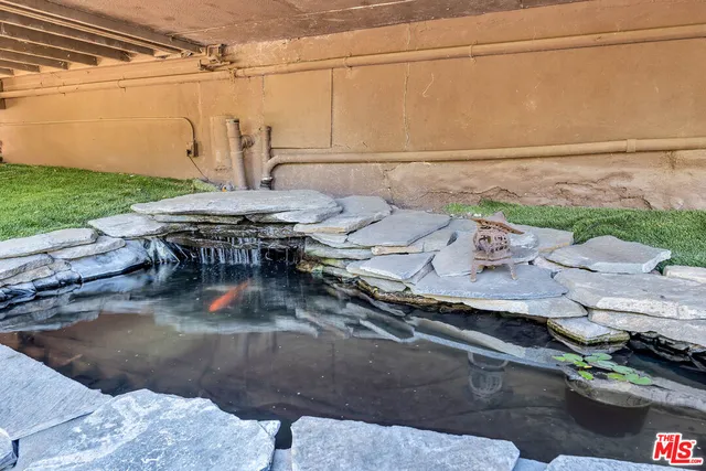 a view of backyard with outdoor seating