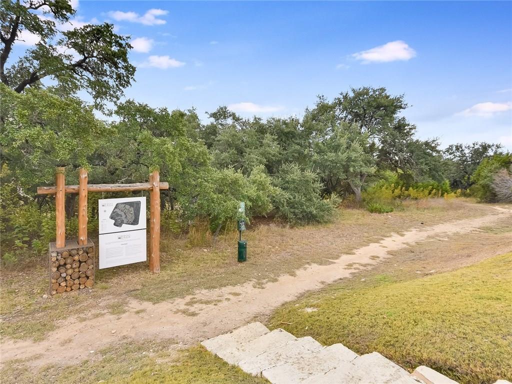 8801 Wild Rice Cove Austin, TX 78738 - Photo 40 of 40 a view of a house with a yard