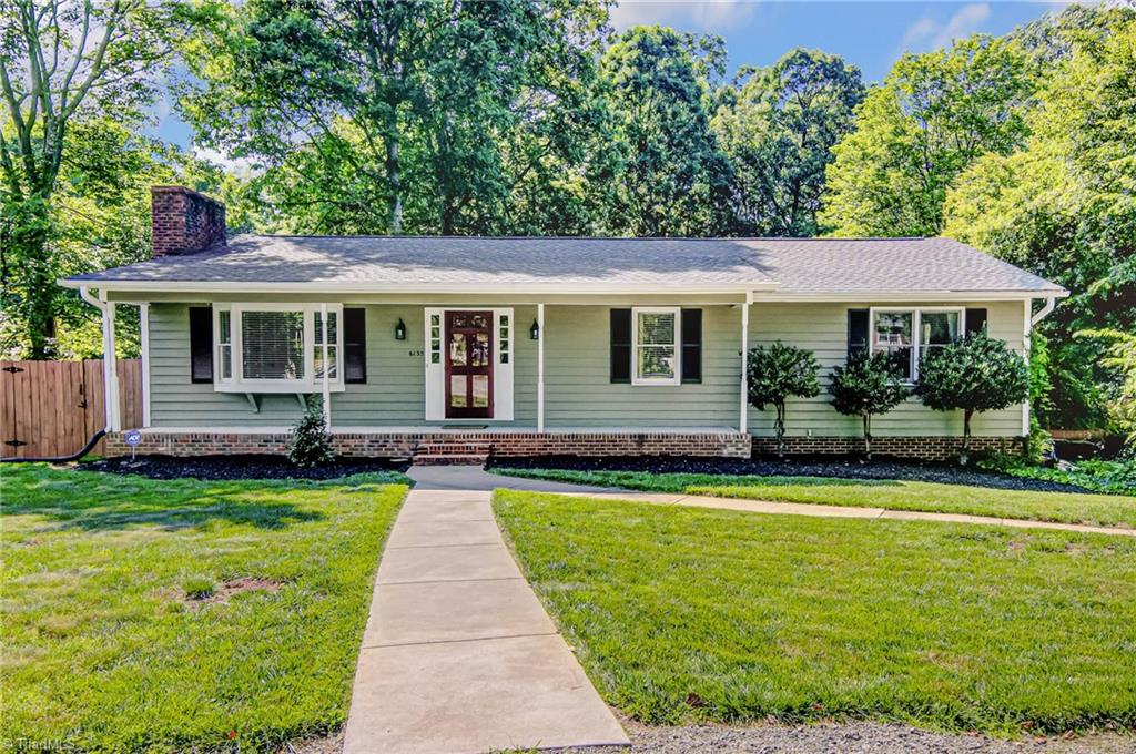6135 Styers Ferry Road Clemmons, NC 27012 - Photo 1 of 29 Nicely manicured lawn, circular driveway