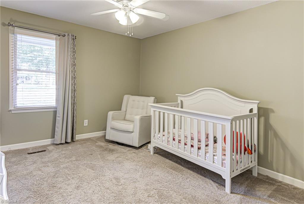 6135 Styers Ferry Road Clemmons, NC 27012 - Photo 14 of 29 Front bedroom
