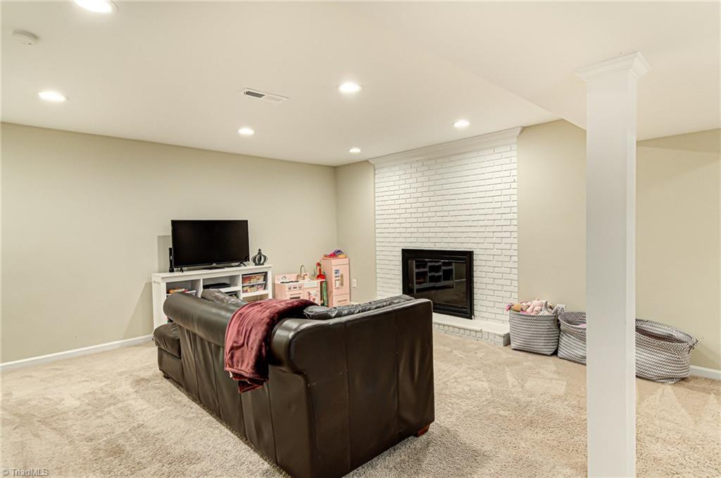 6135 Styers Ferry Road Clemmons, NC 27012 - Photo 20 of 29 Finished basement, flex room with two closets for storage.