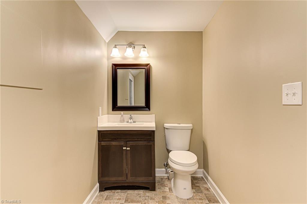 6135 Styers Ferry Road Clemmons, NC 27012 - Photo 23 of 29 Basement 1.2 bathroom, window is in the bathroom and room for possible future shower.
