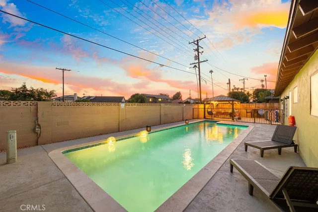 a view of a swimming pool with a lake view