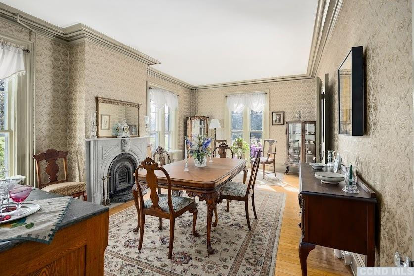 46 Broad Street Kinderhook, NY 12106 - Photo 13 of 44 a view of a a dining room with furniture window and wooden floor