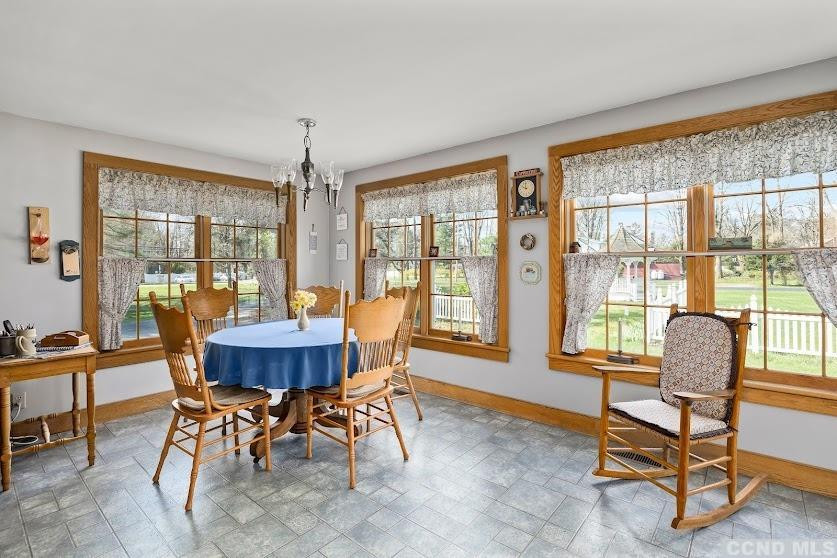 46 Broad Street Kinderhook, NY 12106 - Photo 16 of 44 a dining room with furniture window and outside view