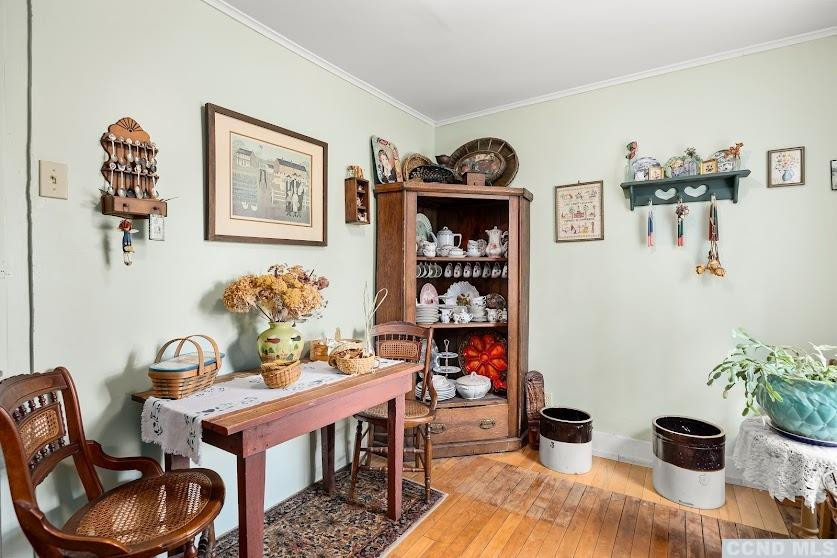 46 Broad Street Kinderhook, NY 12106 - Photo 17 of 44 a dining room with furniture and wooden floor