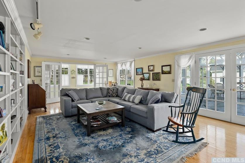 46 Broad Street Kinderhook, NY 12106 - Photo 18 of 44 a living room with furniture and wooden floor
