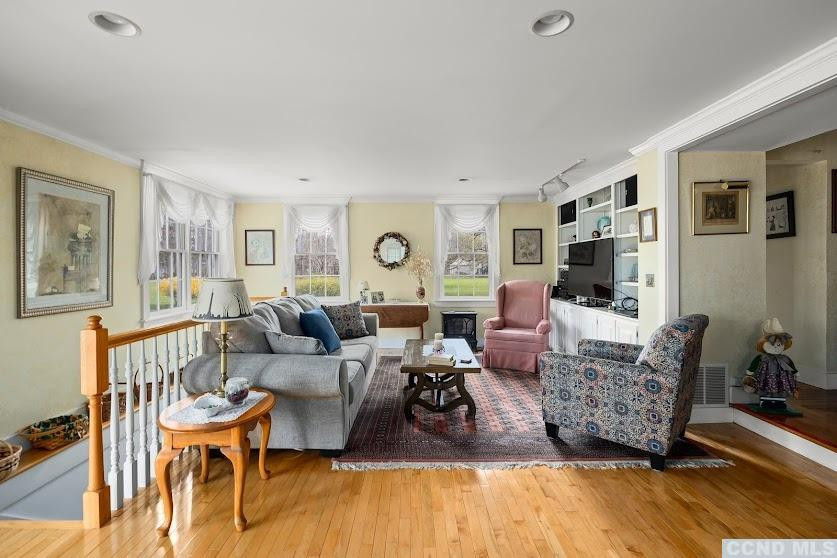 46 Broad Street Kinderhook, NY 12106 - Photo 19 of 44 a living room with furniture and a flat screen tv