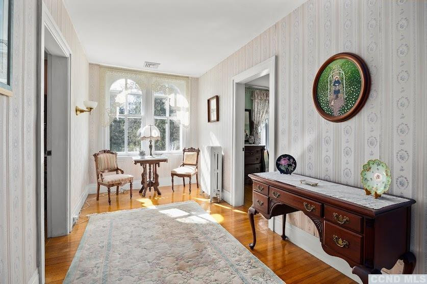 46 Broad Street Kinderhook, NY 12106 - Photo 22 of 44 a view of a dining room with furniture and chandelier