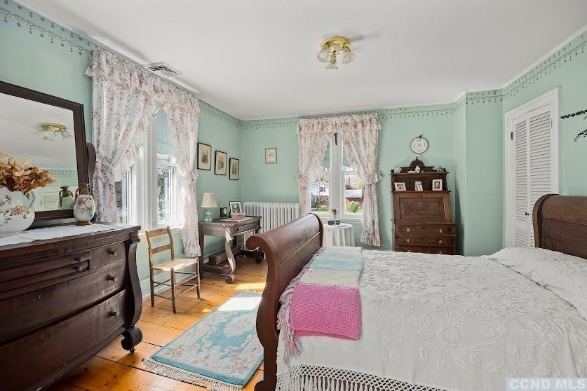 46 Broad Street Kinderhook, NY 12106 - Photo 24 of 44 a bedroom with furniture and a dresser