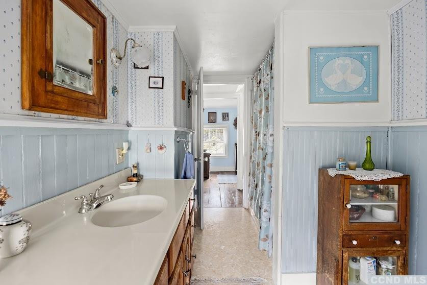 46 Broad Street Kinderhook, NY 12106 - Photo 27 of 44 a en suite bathroom with a sink double vanity and a mirror