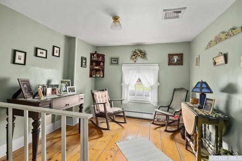 46 Broad Street Kinderhook, NY 12106 - Photo 28 of 44 a view of a livingroom with workspace and a couch