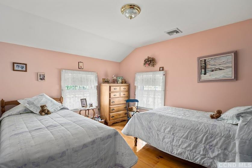 46 Broad Street Kinderhook, NY 12106 - Photo 30 of 44 a bedroom with a bed and dresser