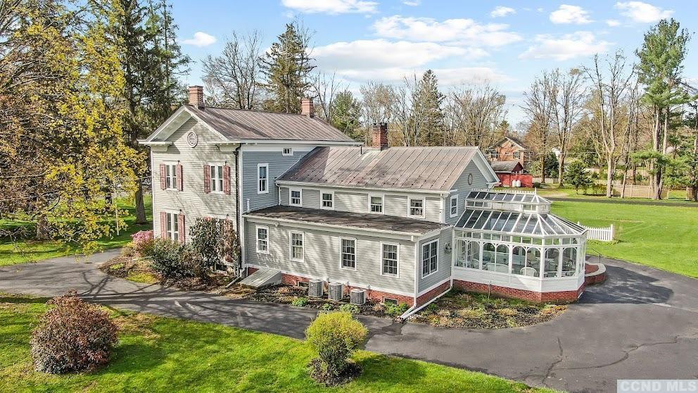 46 Broad Street Kinderhook, NY 12106 - Photo 3 of 44 a view of a house with a yard
