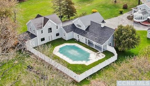 46 Broad Street Kinderhook, NY 12106 - Photo 32 of 44 an aerial view of a house with a garden and swimming pool