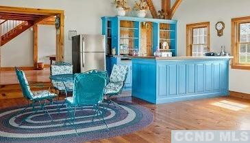 46 Broad Street Kinderhook, NY 12106 - Photo 41 of 44 a view of a living room with furniture and kitchen view