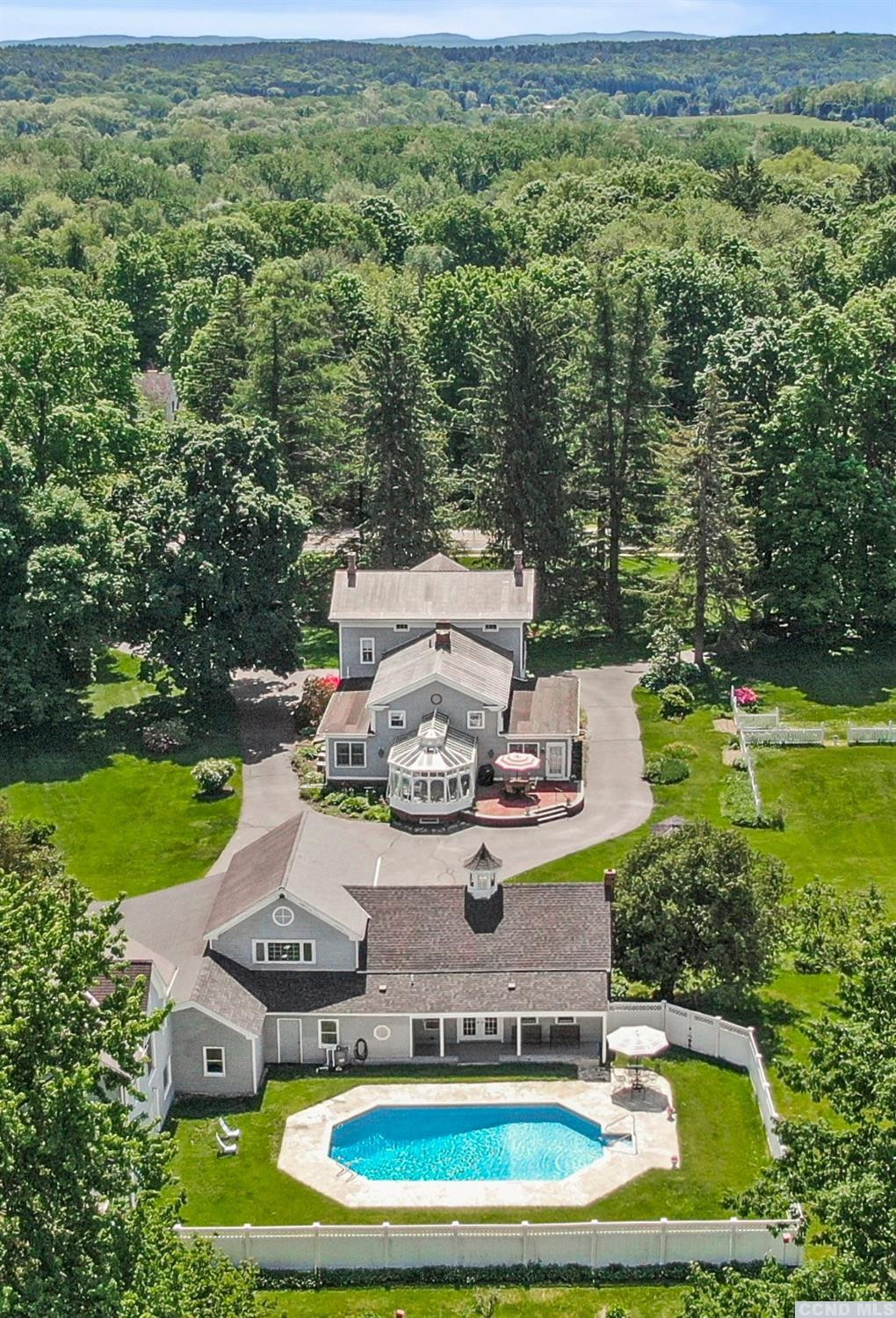46 Broad Street Kinderhook, NY 12106 - Photo 44 of 44 an aerial view of a house with a yard basket ball court and outdoor seating