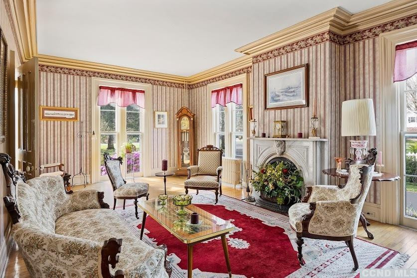 46 Broad Street Kinderhook, NY 12106 - Photo 9 of 44 a living room with furniture and a large window