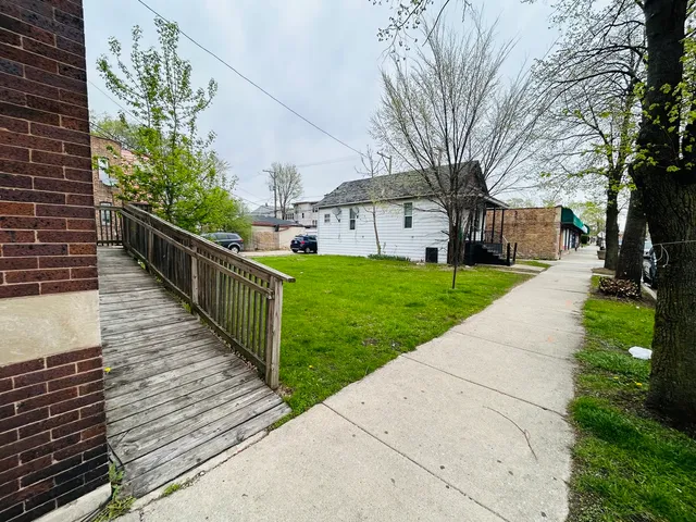 $399,999 | 7459 South Champlain Avenue, Chicago, IL 60619