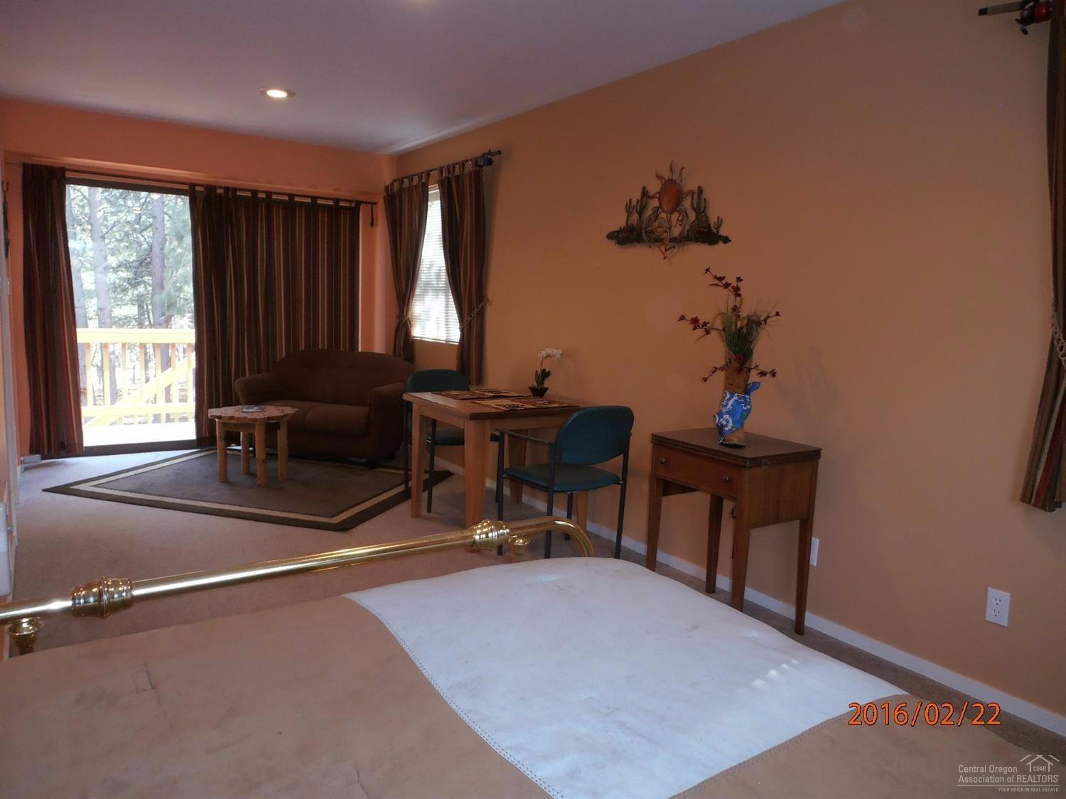 60330 East Ridgeview Drive Bend, OR 97702 - Photo 19 of 25 3rd bedroom sitting area with slider to
