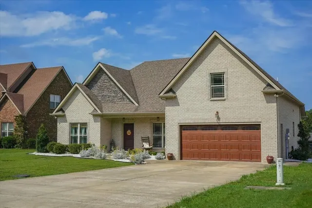 a living room with furniture flat screen tv and a fireplace