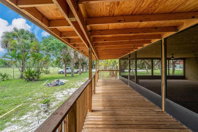a view of swimming pool from a balcony
