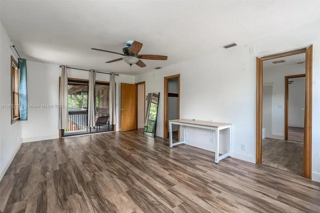 a view of an empty room and window