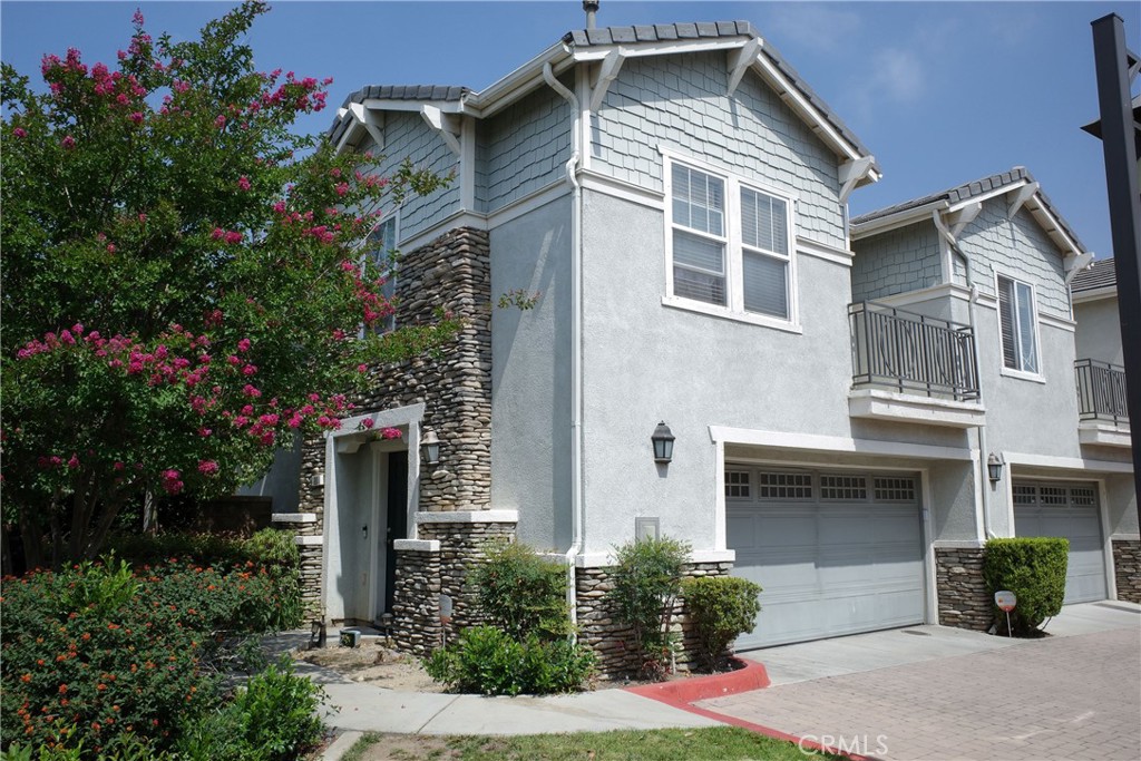 7331 Shelby Place Rancho Cucamonga, CA 91739 - Photo 1 of 17 a front view of a house with a yard