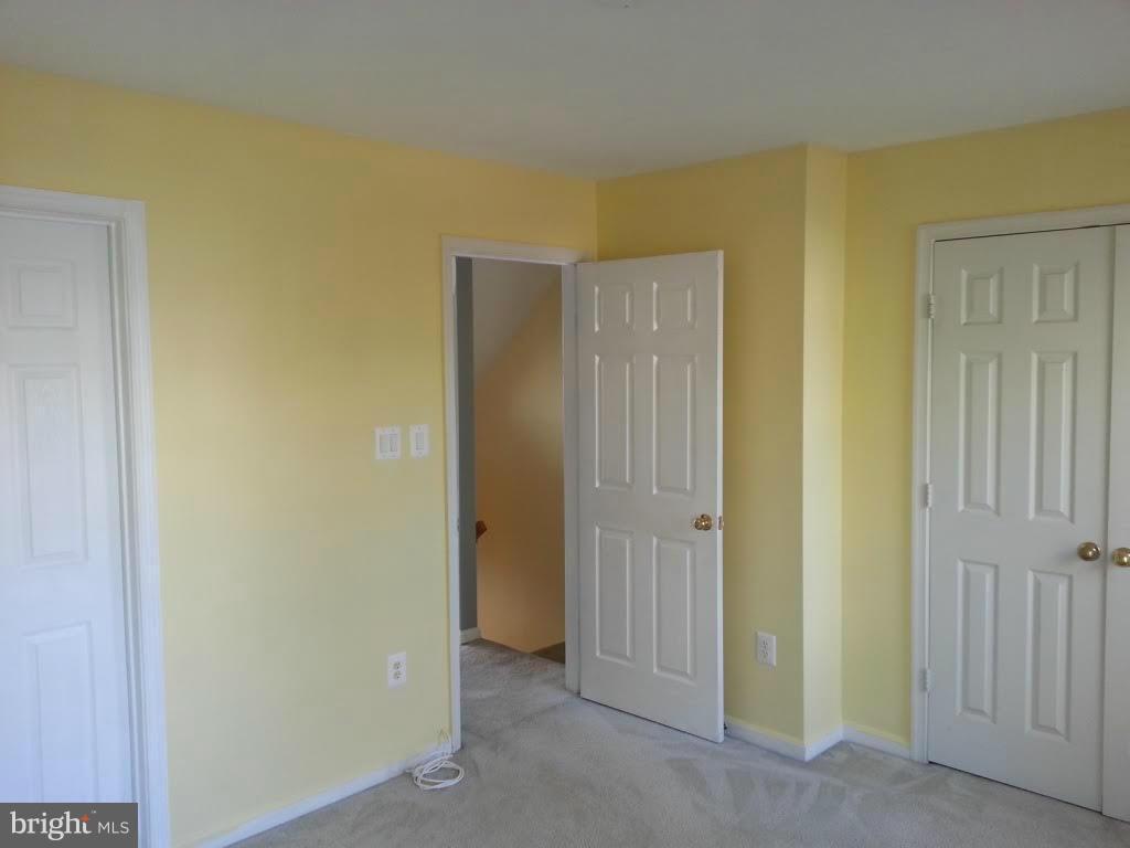 45053 Fellowship Square Ashburn, VA 20147 - Photo 5 of 9 a view of a hallway with closet area